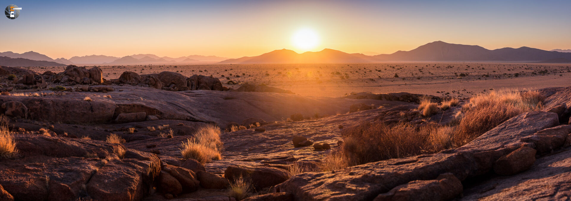 Setting sun behind the Tiras Mountains Vol.3