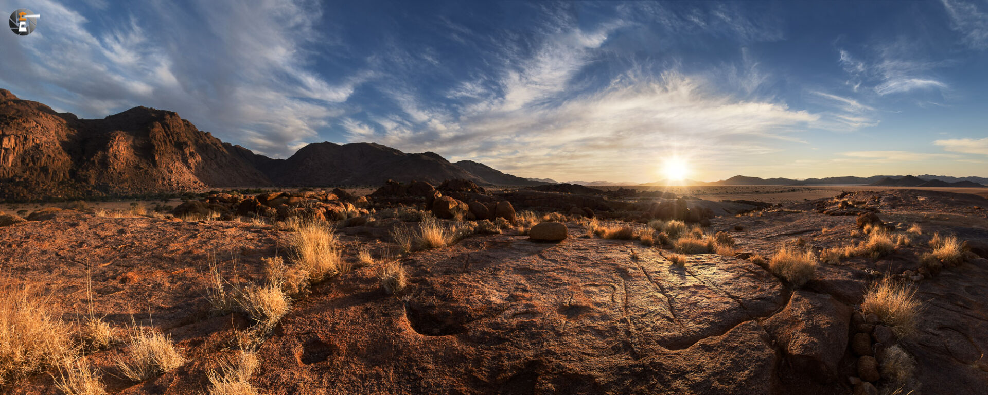 Setting sun over Tiras Mountains